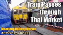 Train passes through Thai Market