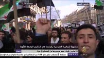 وقفة للجالية السورية بفرنسا في الذكرى الرابعة للثورة