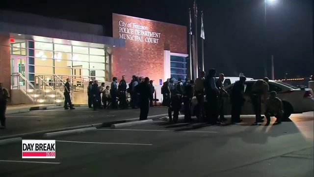 Arrest made in Ferguson shooting that left 2 police wounded