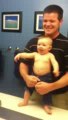 Baby adorably flexes muscles with dad_(240p).flv