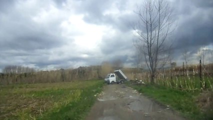 Illegal Dumping Garbage on the Road in Italy