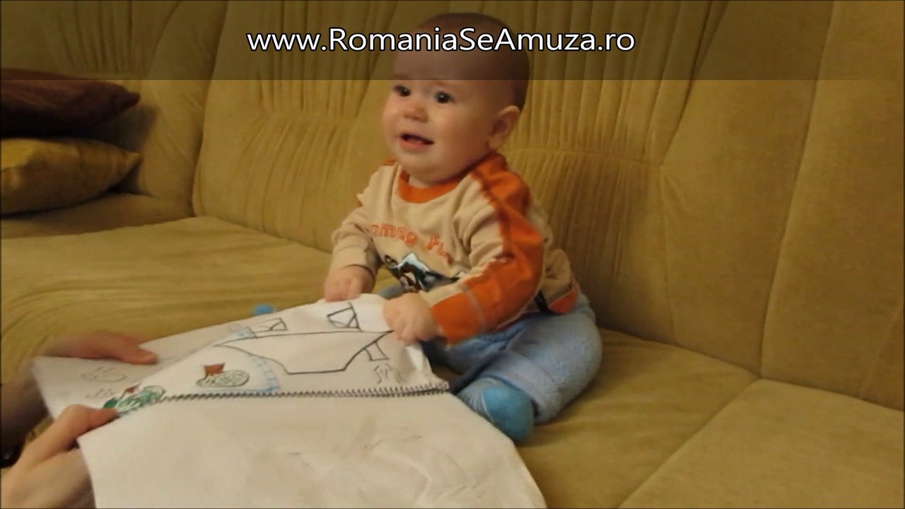 Un bebelus se supara ca ii este luat caietul - Copii Haiosi - Romania se Amuza