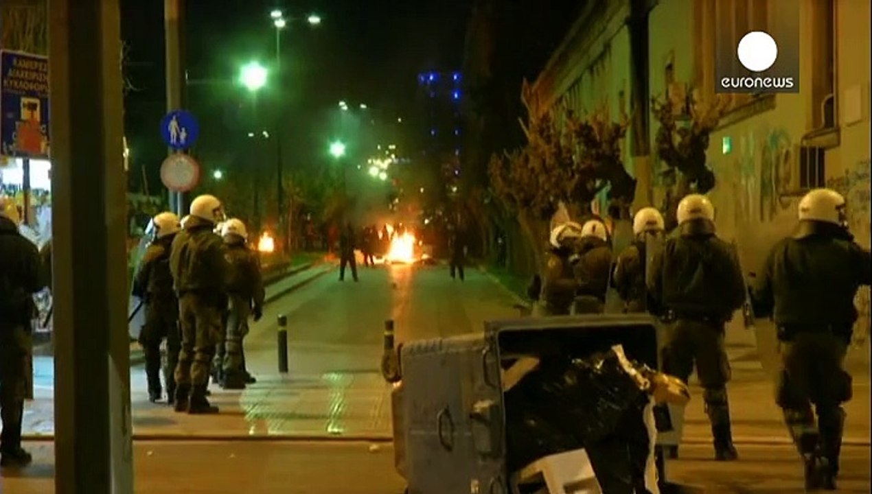 Hooded anarchists clash with Greek riot police in Athens