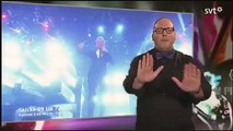 Un interprète en langue des signes vole la vedette d'un chanteur en direct!