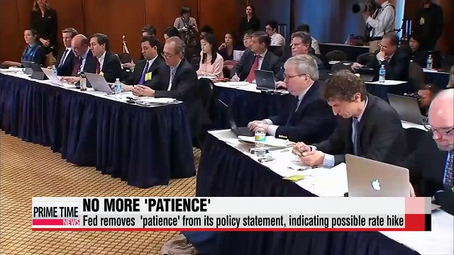 U.S. Fed opens door for rate hike but slashes growth, inflation outlook