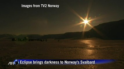 Eclipse brings darkness to Norway's Svalbard
