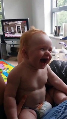 Baby scared and laughing at the same time (Very Funny)