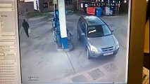 driver looking his car's petrol cap - funny