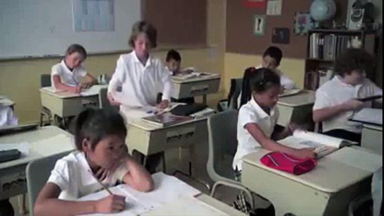 Romantic School boy purpose to his teacher  - A flying kiss by school kid