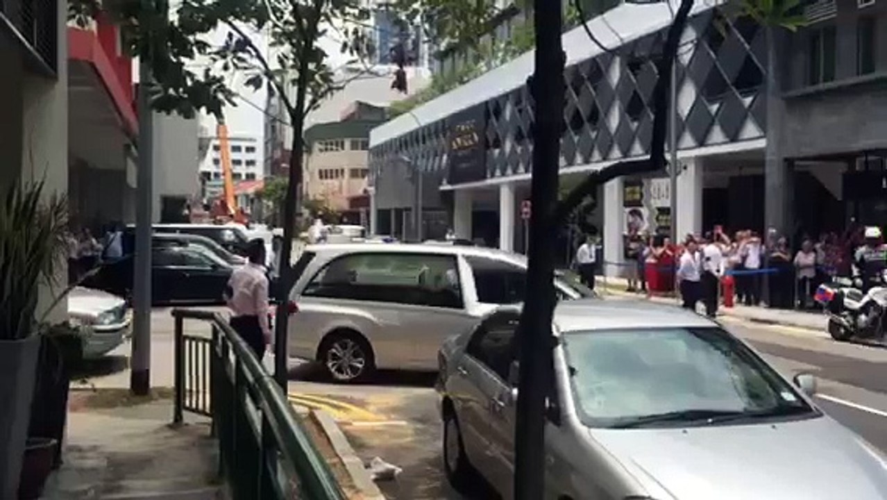 Hearse carrying Mr Lee Kuan Yew's body leaving lavender