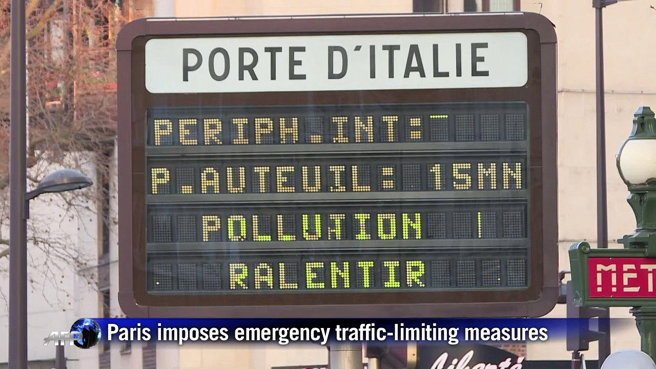 Smog-choked Paris forces half of cars off roads