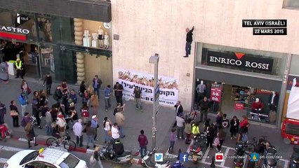 Un magicien reste suspendu à un mur pendant 5 heures