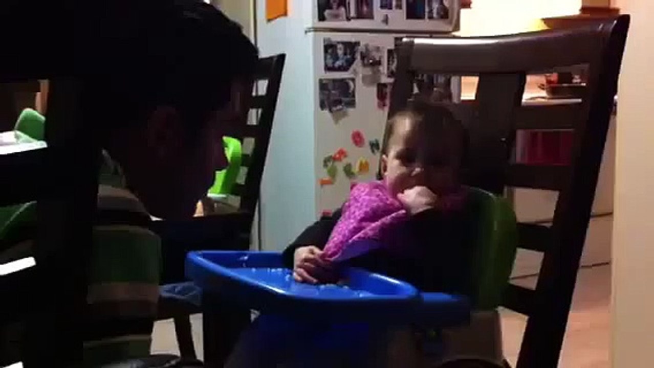 Baby Keauni feeding daddy