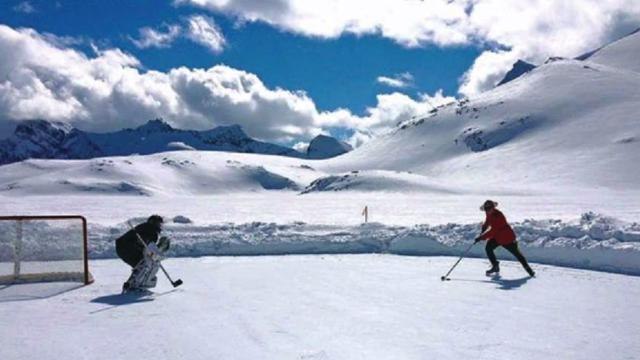 Mountie Playing Hockey Photo Goes Viral, Declared 'Most Canadian Thing Ever'