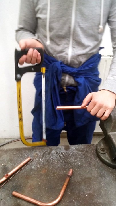 Couper une barre de cuivre