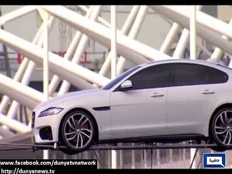 Jaguar launches car after driving display on rope over