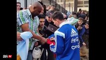 Messi sign shirts for fans