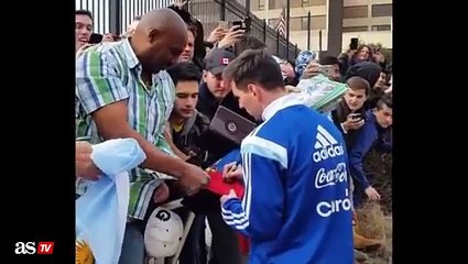 Messi sign shirts for fans