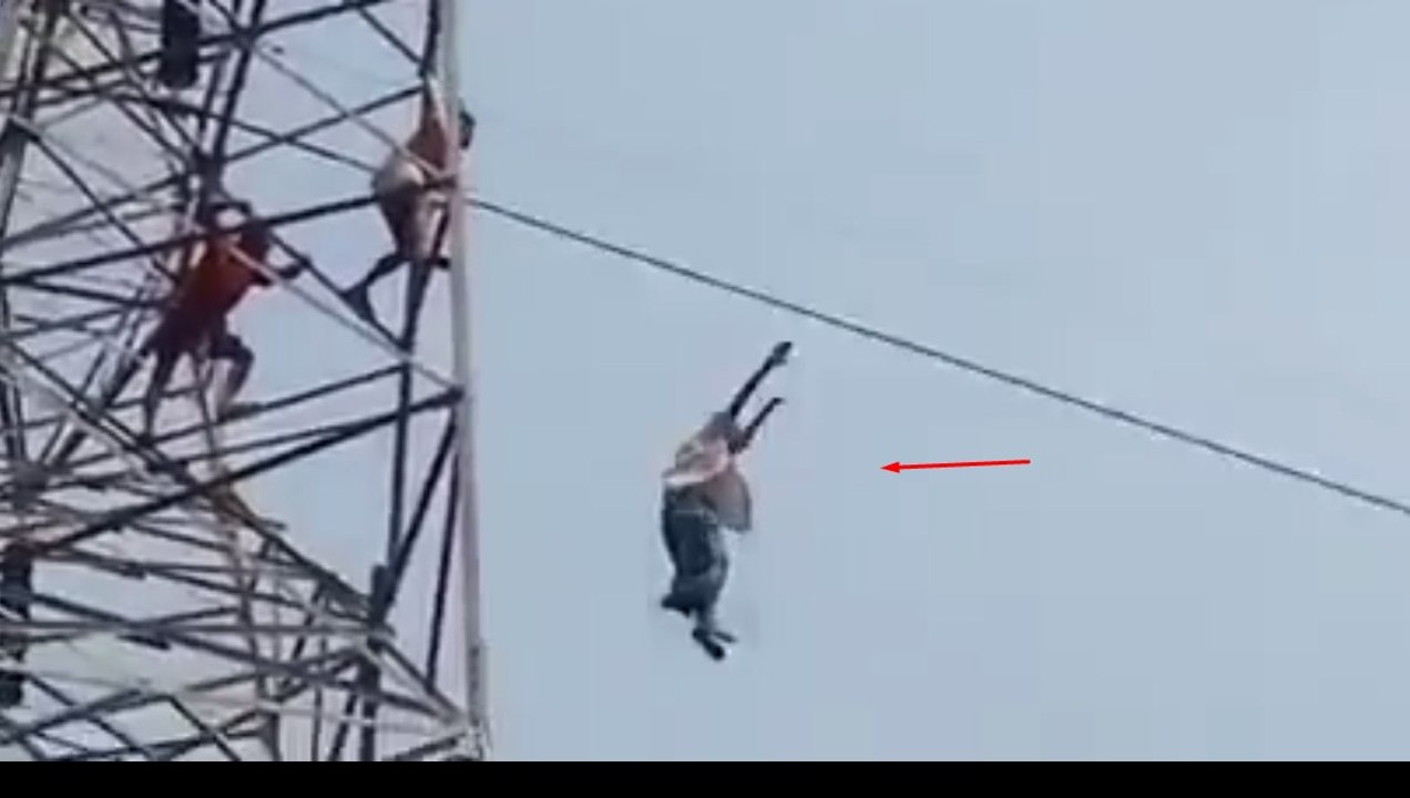 Suicidal Man Dangles from Power Lines