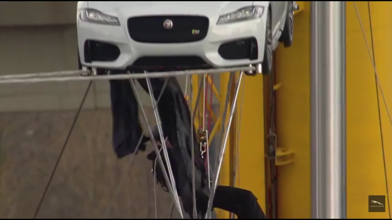 UK: Watch all-new Jaguar XF unveiled by driving on TIGHTROPE... across the river Thames!