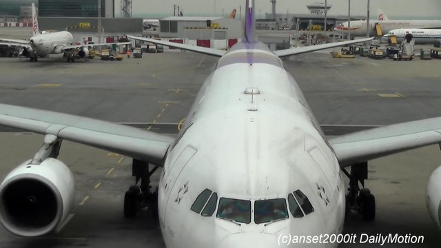 Airbus A330 Thai Airways. Pushback at Hong Kong Airport. Flight TG603 to Bangkok. HS-TEQ