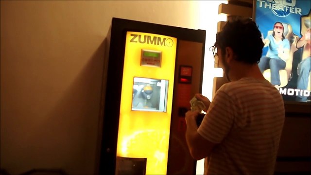 Check out this Orange Squeezing Juice Vending Machine