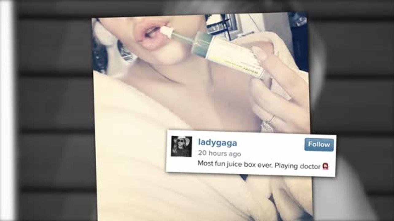 Lady gaga mit einer saft-spritze
