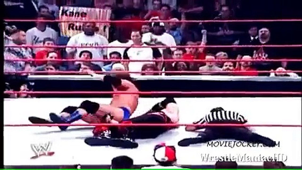 Kane Removes His Mask and show His Burning face