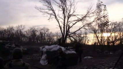 Heavy machinegun fire as Ukrainian soldier is wounded