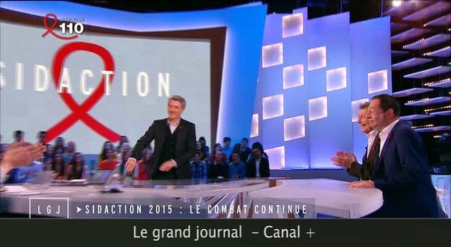 Antoine de Caunes embrasse Jean-Luc Romero au grand journal