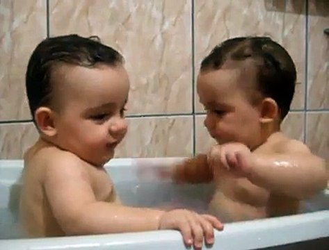 Twins Brothers Enjoying Bath Time