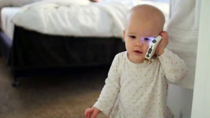 amazing little kid talking on mobile phone.