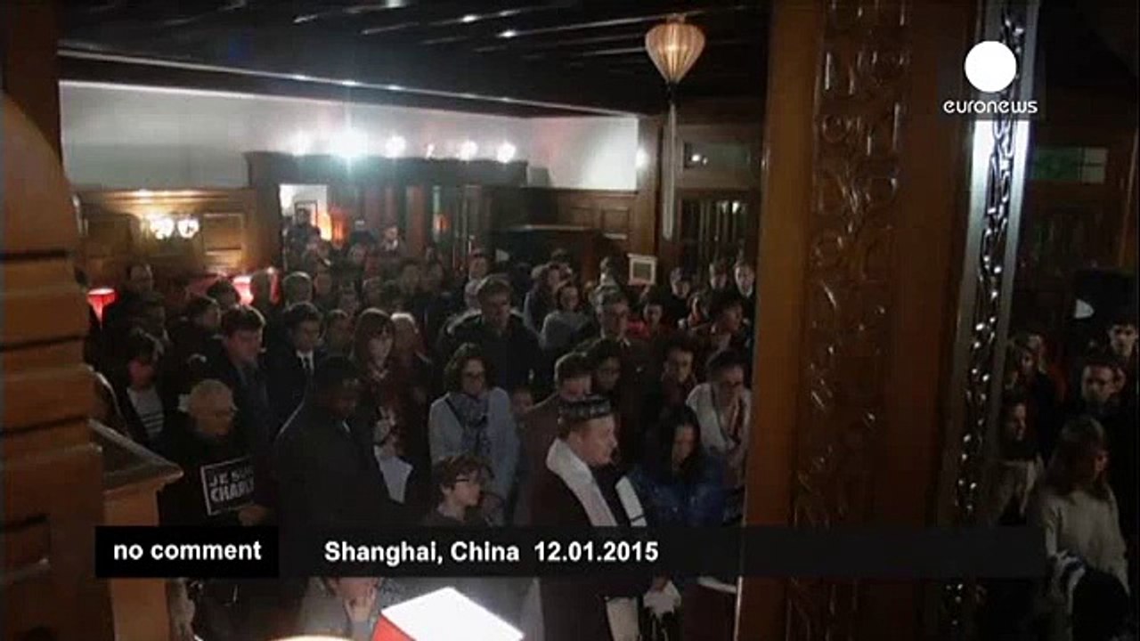 Hundreds gather in Shanghai to remember victims of Charlie Hebdo attack - no comment