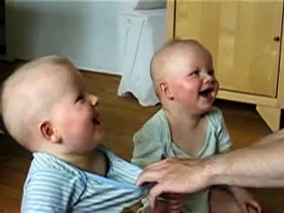laughing twins - twin babies laugh at their father