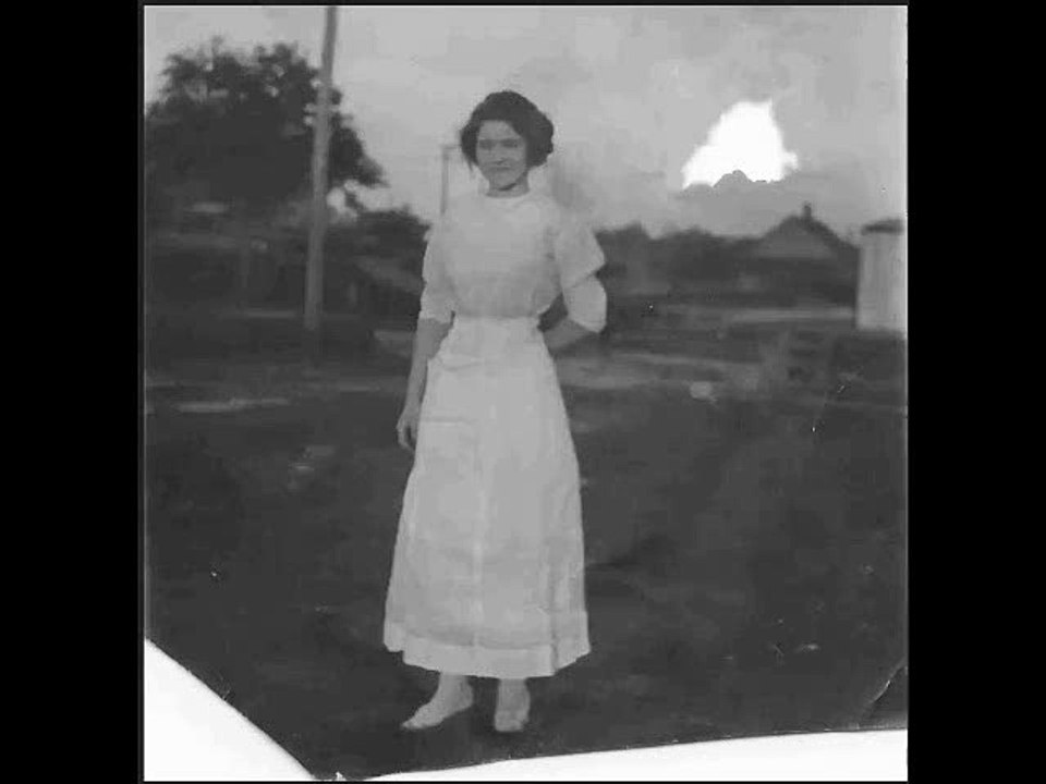 Restoration & colorisation of a photograph with a hole