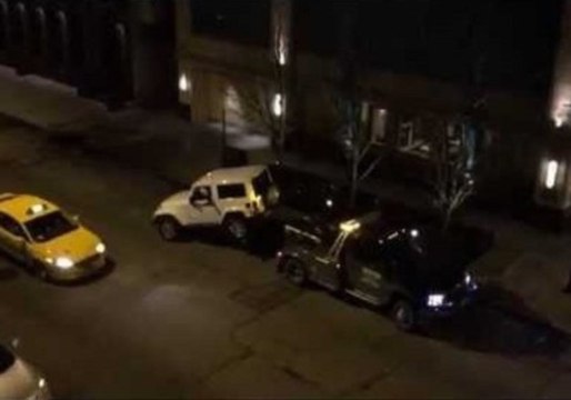 Daring Driver Cheekily Escapes Tow Truck