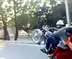 One wheeling by my friend with his girl friend in Lahore