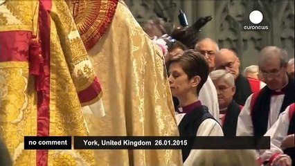 Woman becomes first female Church of England priest - no comment