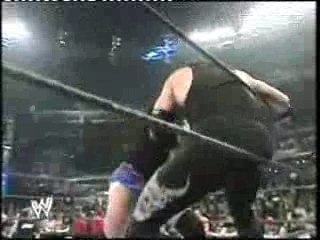 Undertaker Beats up Helms and Keneddy