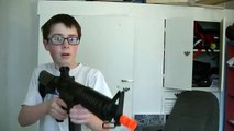 KID SHOOTS SCREEN WITH AIRSOFT GUN