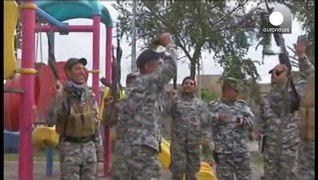 Иракская армия празднует победу в битве за Тикрит