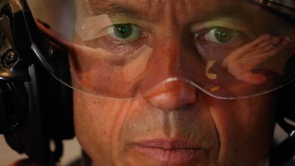 A fighter pilot helmet with 360 degrees of sky