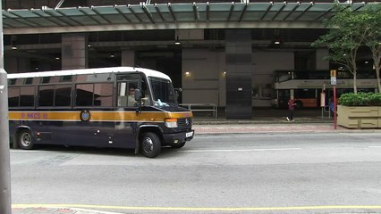 British banker back in court over Hong Kong double murder