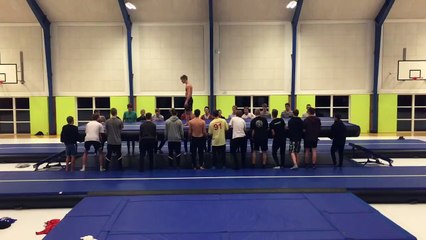 Awesome quadruple backflip with a little help from friends