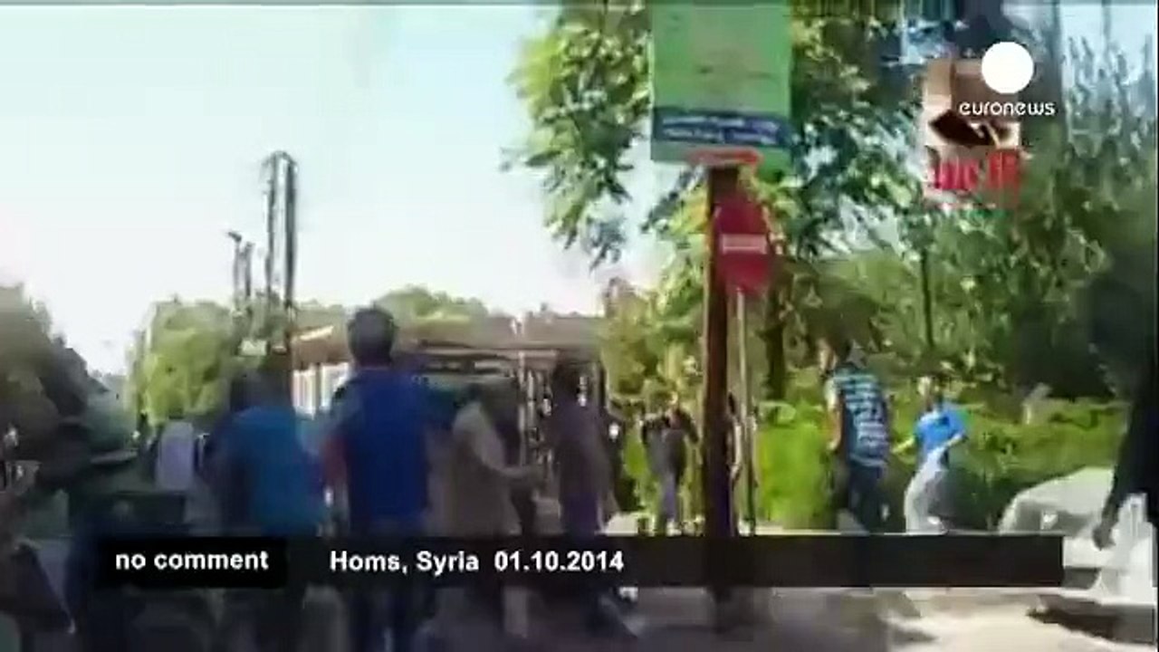 [Graphic footage] Syria - twin car bombings kill 22 people, including 10 children - no comment