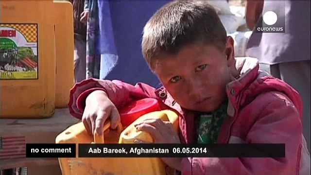 Afghan President Hamid Karzai visits landslide victims - no comment