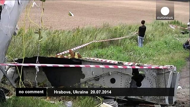 Debris from flight MH17 still in Ukraine while Malaysia mourns - no comment