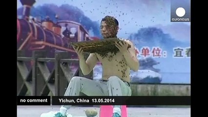 Man breaks Guinness record for the longest time spent covered in bees - no comment