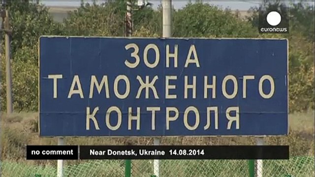 Russian aid convoy reaches Ukraine border - no comment