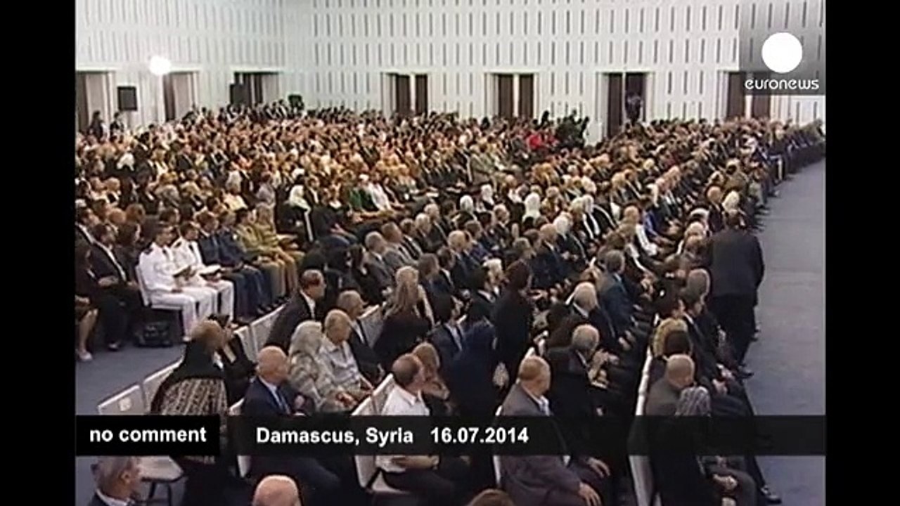 Syrian President Bashar al Assad is sworn in for a new seven-year term - no comment